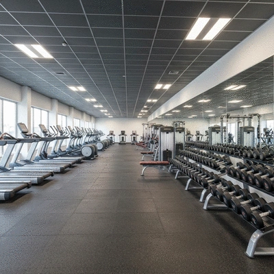 Expansive big-box gym interior with a wide array of modern fitness equipment, bright lighting, no text, no words, no typography, 8K